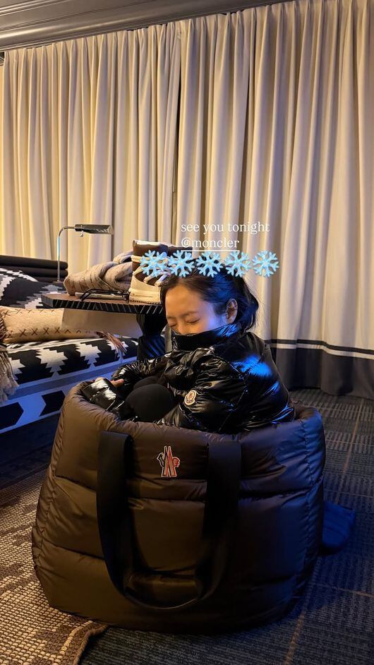 BLACKPINK's Jennie Fits Into Giant Bag, Showcasing Doll-like Visuals