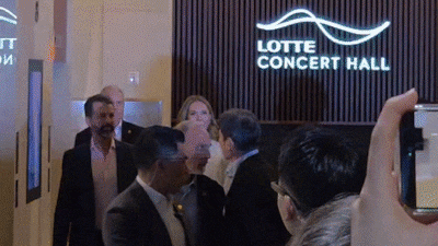 Donald Trump Jr. Signs MAGA Hats at Shinsegae Chairman's Wife's Concert