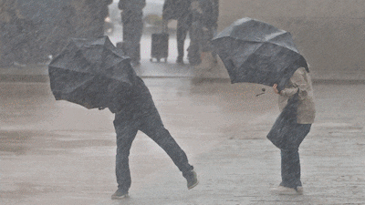 Heavy Autumn Rain Submerges Seoul Roads as Fallen Leaves Block Drains