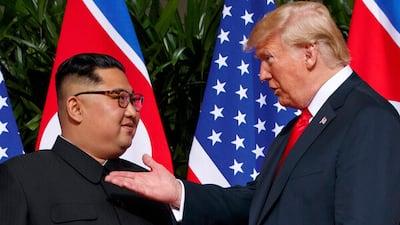 2018년 6월12일 도널드 트럼프(오른쪽) 미국 대통령이 싱가포르 센토사섬에서 김정은 북한 국무위원장과 만났다. photo 뉴시스