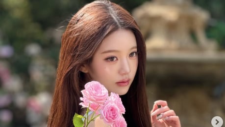 Jang Won-young Channels Fairy-Tale Princess in Rose Garden Photos