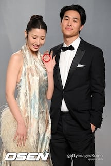 EJAE and Fiancé Sam Kim Share Romantic Kiss at Oscar After-Party