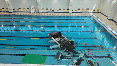 Car Crashes Through Glass Into Miryang Swimming Pool