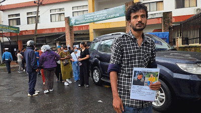 Walls of Missing, Gates of the Dead: Nepal Families Weep