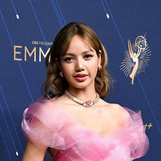 lisa blackpink pink dress PRETTY IN PINK LOOK: Blackpink's LISA captivated her fans as she shared photos of her stunning look in a swirling pink gown at the Emmy Awards. "First Emmys experience with my